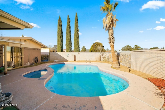 view of swimming pool featuring a patio