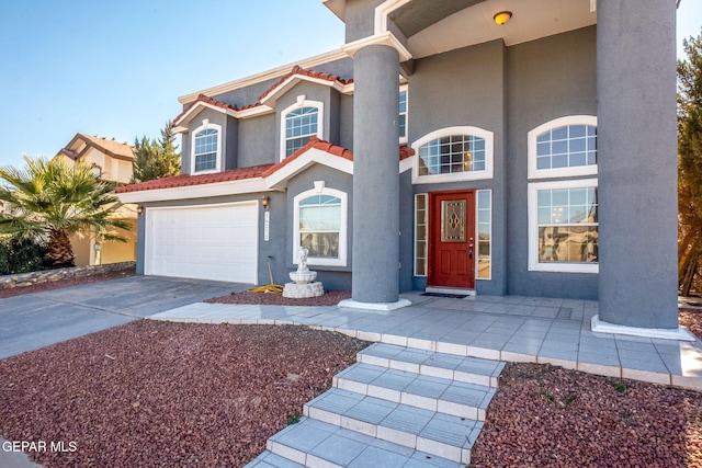 view of front of property with a garage