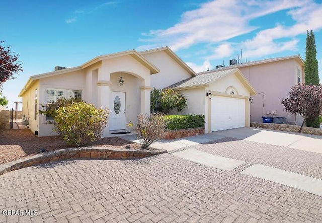 view of front of property featuring a garage