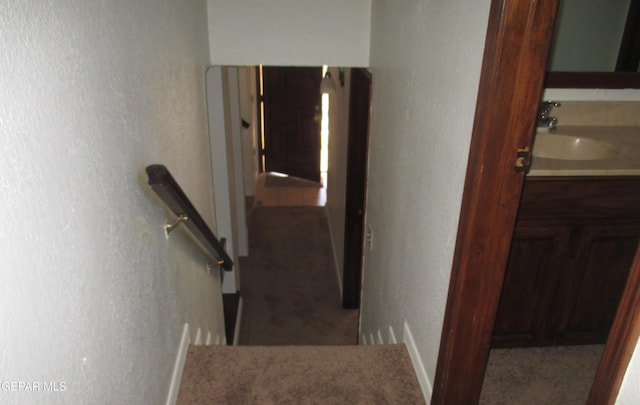 stairs featuring sink