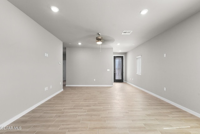 empty room featuring ceiling fan