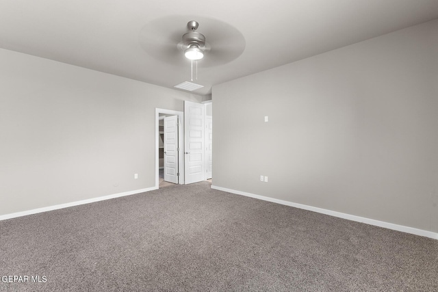 spare room featuring ceiling fan, baseboards, and carpet flooring