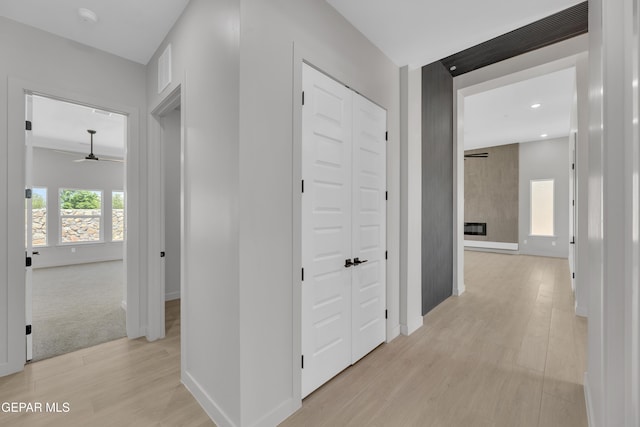 12869 Kingsbury Ave, Horizon City, TX 79928 - corridor featuring recessed lighting, baseboards, and light wood-style floors