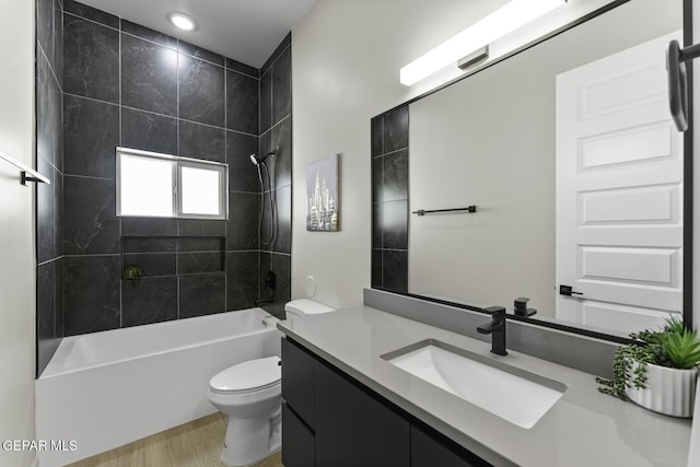 12869 Kingsbury Ave, Horizon City, TX 79928 - bathroom with vanity,  shower combination, and wood finished floors