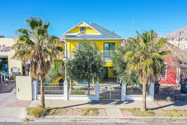 view of front of house with a balcony