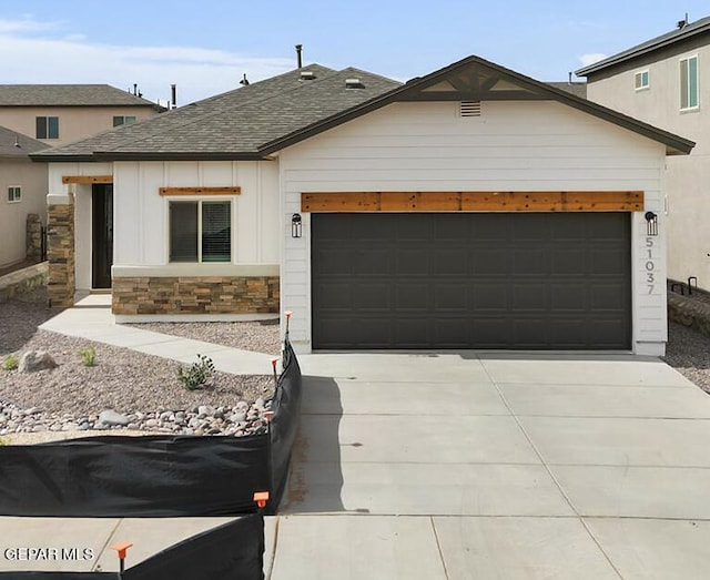 view of front of home with a garage