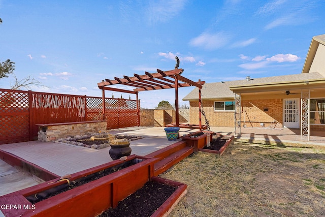 exterior space featuring a pergola and a patio