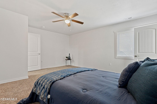 bedroom featuring ceiling fan and carpet floors