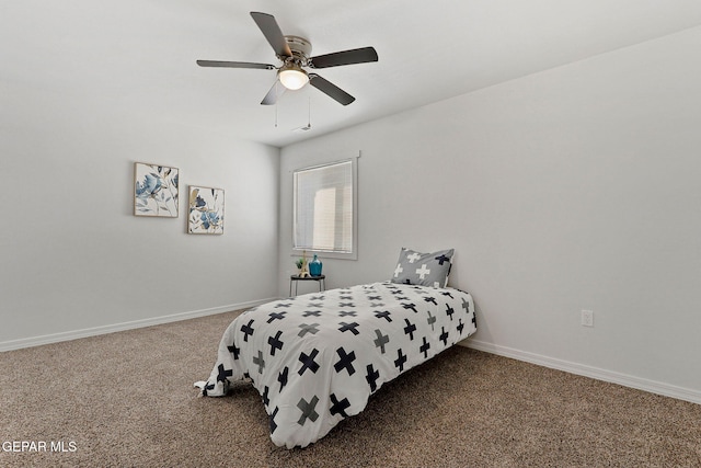 bedroom featuring ceiling fan and carpet floors