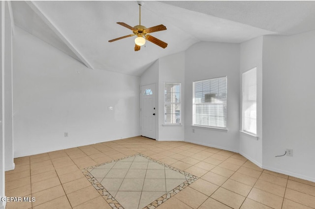 interior space featuring ceiling fan and lofted ceiling