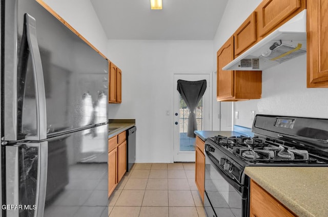 kitchen with light tile patterned floors and black appliances