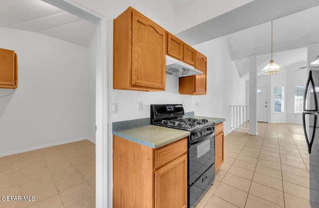 kitchen featuring black appliances, light tile patterned floors, vaulted ceiling, and pendant lighting