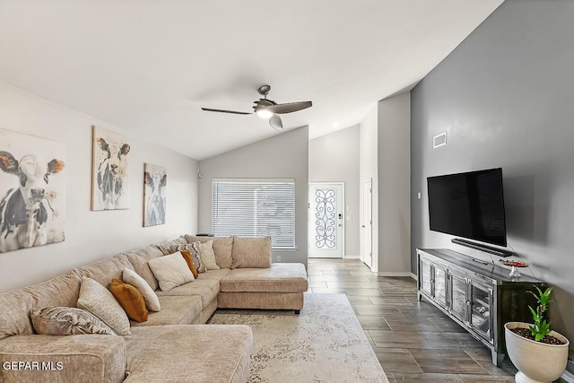 living room with ceiling fan and lofted ceiling