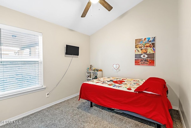 carpeted bedroom with ceiling fan and lofted ceiling