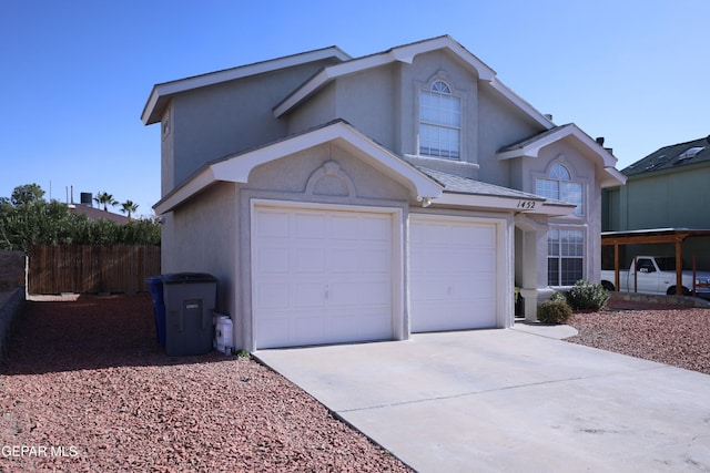 front facade with a garage