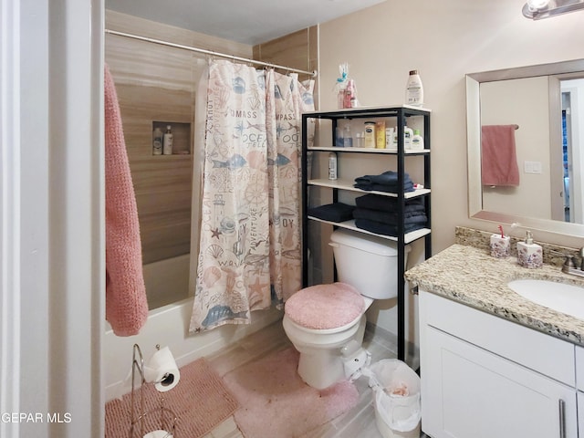 full bathroom featuring toilet, vanity, and shower / bath combo