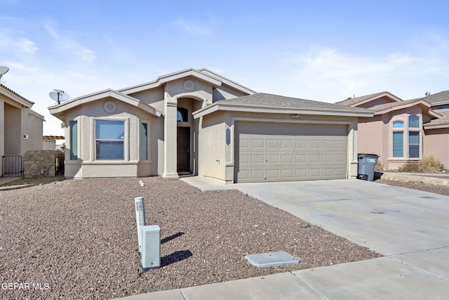 ranch-style house featuring a garage