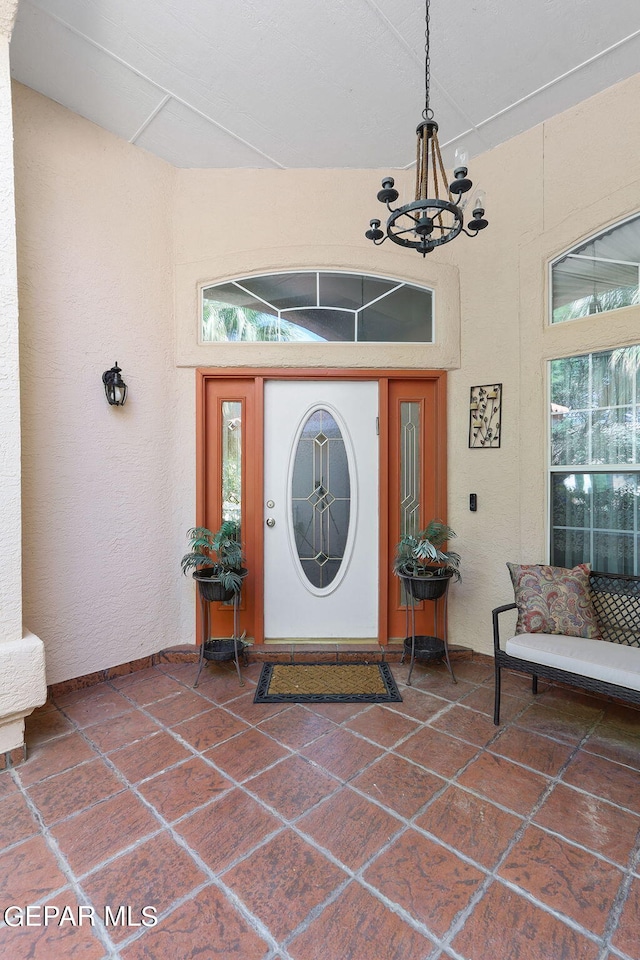 entrance to property with a patio