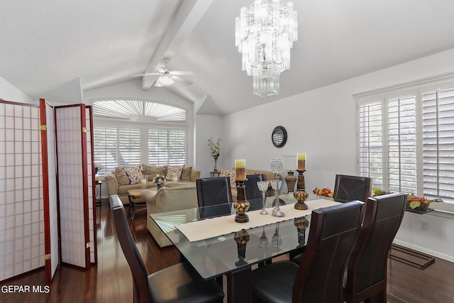 dining area featuring dark wood-style floors, lofted ceiling with beams, baseboards, and ceiling fan with notable chandelier