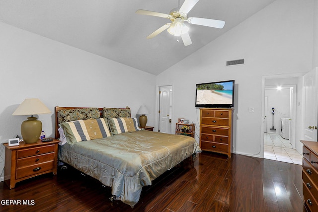 bedroom featuring lofted ceiling, ceiling fan, visible vents, and wood finished floors