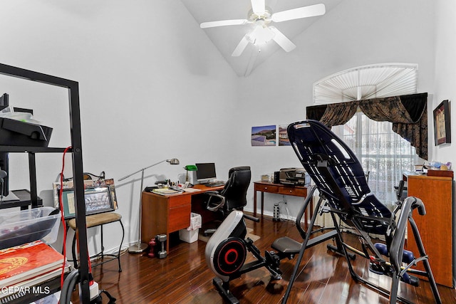 exercise room with high vaulted ceiling, baseboards, a ceiling fan, and wood finished floors