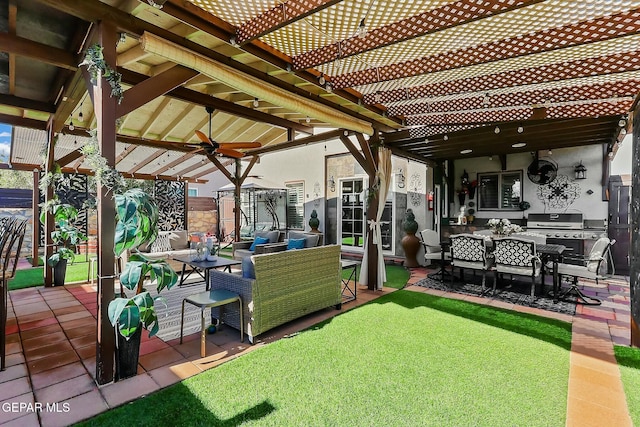 view of patio / terrace featuring ceiling fan, a grill, and an outdoor living space