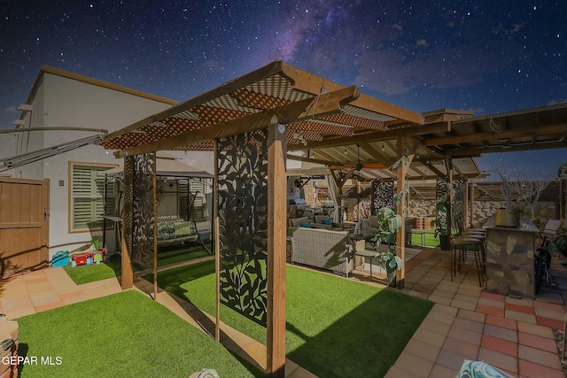 view of patio / terrace with a pergola and outdoor lounge area