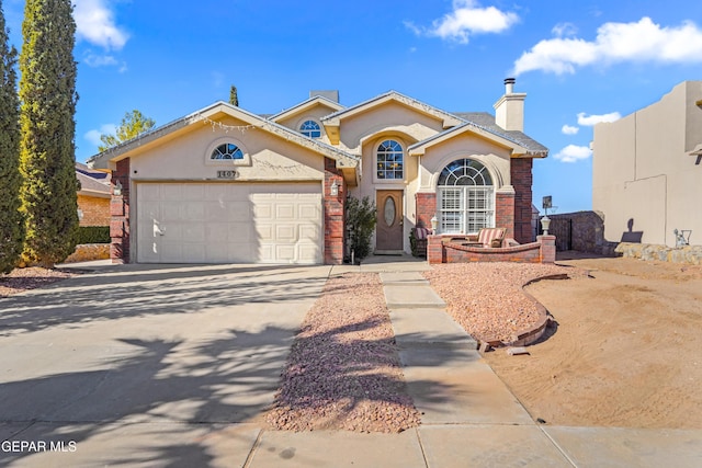 view of front of property featuring a garage