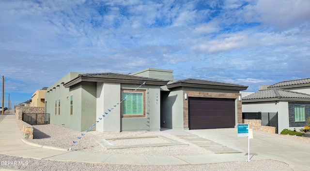 prairie-style home with a garage