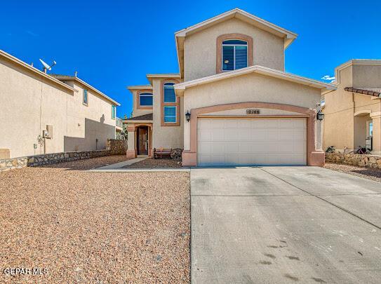 view of front of home with a garage