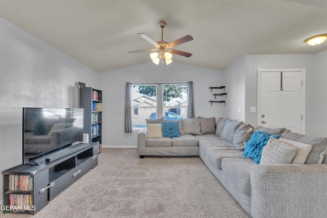 carpeted living room featuring ceiling fan and lofted ceiling