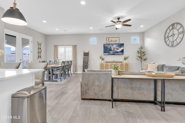 living room with ceiling fan