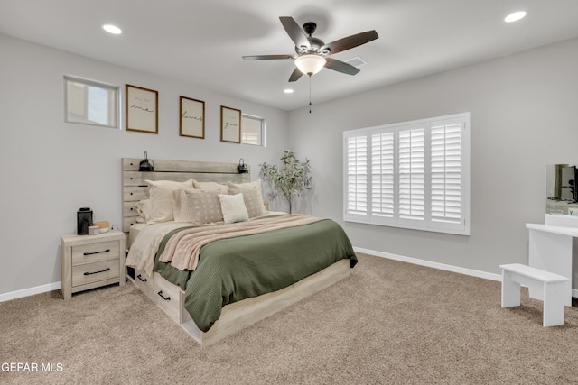 carpeted bedroom with ceiling fan