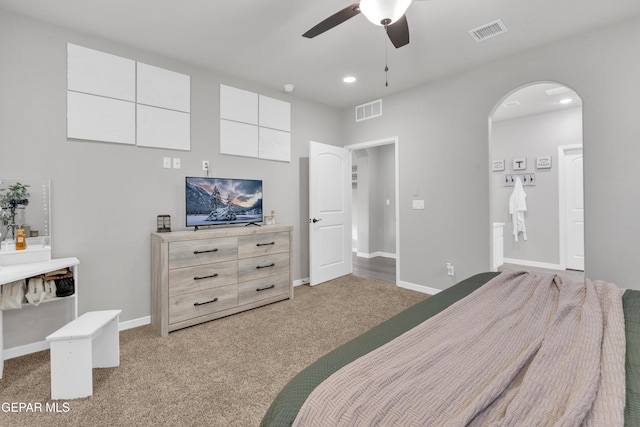 bedroom with light colored carpet and ceiling fan