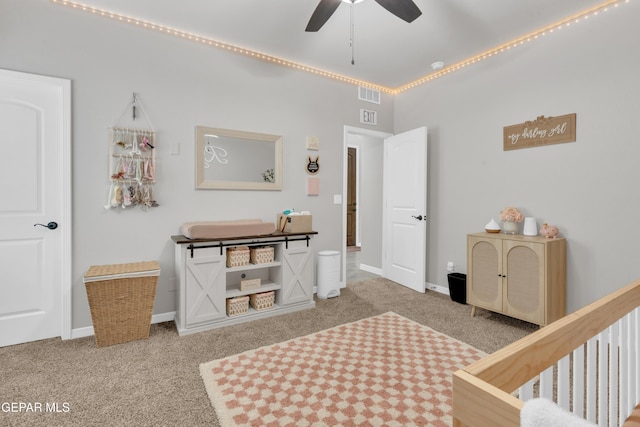 carpeted bedroom with ceiling fan