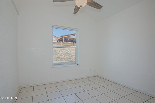 spare room featuring lofted ceiling and ceiling fan