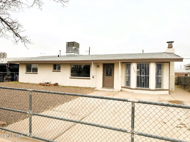 ranch-style house featuring central AC