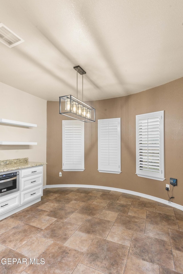 view of unfurnished dining area