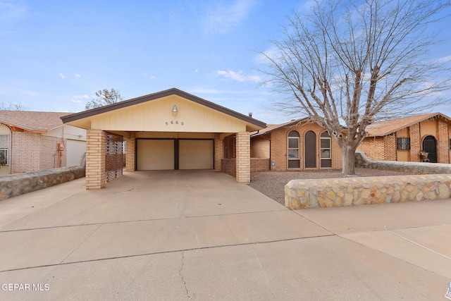 single story home featuring a garage