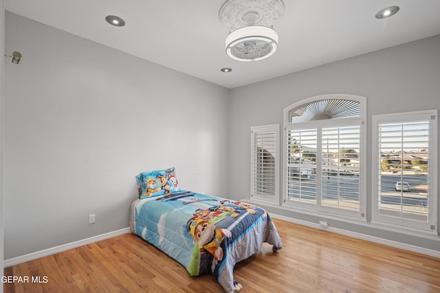 bedroom featuring wood-type flooring