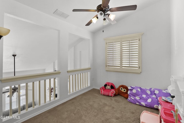 game room featuring ceiling fan, carpet, and lofted ceiling