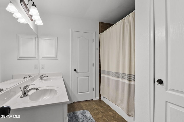 bathroom featuring vanity and a shower with curtain