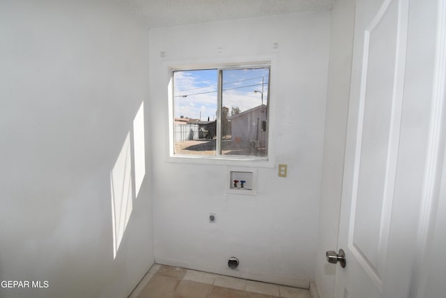 laundry area with hookup for a washing machine and electric dryer hookup