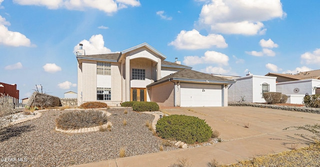 front of property with a garage