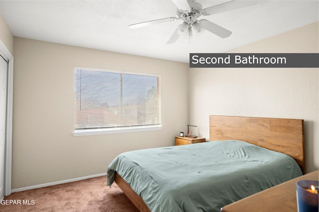 bedroom with ceiling fan and carpet