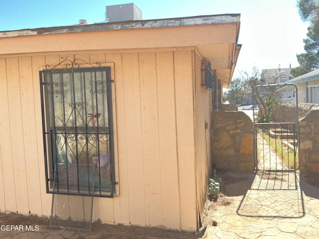 view of property exterior with central AC unit