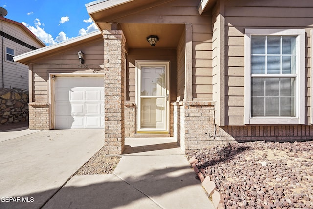 property entrance with a garage