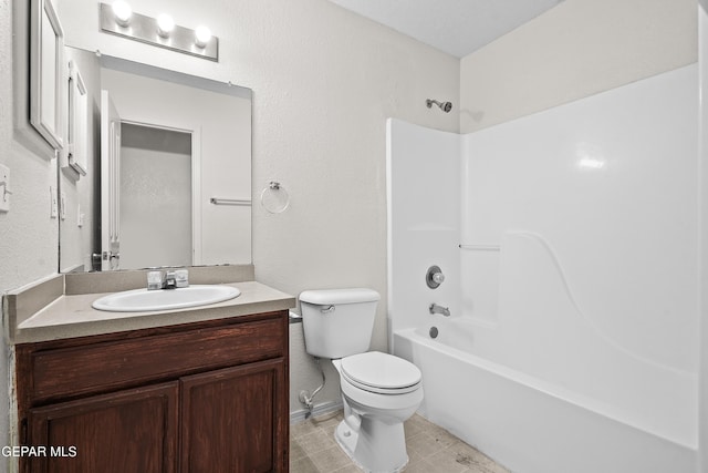 full bathroom featuring toilet, vanity, and shower / bathtub combination