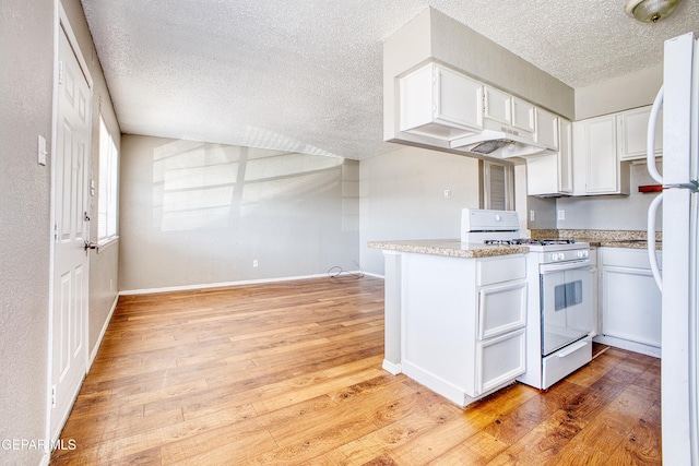 kitchen featuring a textured ceiling, white cabinetry, white range with gas cooktop, kitchen peninsula, and light wood-type flooring