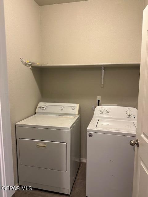 laundry area with washer and dryer